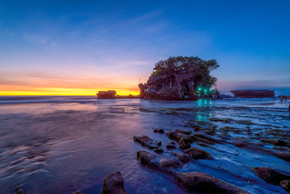 Visit Tanah Lot at sunset for the perfect Insta-shot.