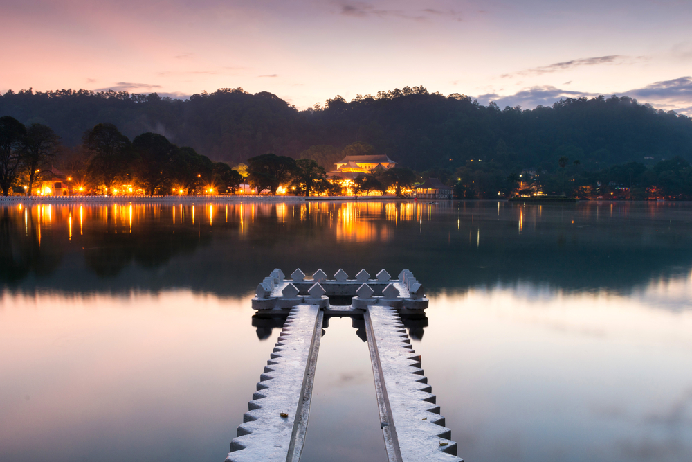 Enjoy the tranquility of a walk around Kandy lake.